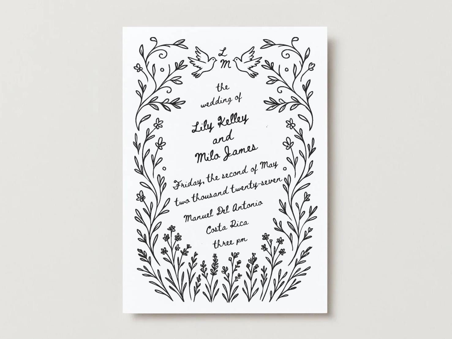 Gorgeous hand drawn wedding invitation with swirling wildflowers, doves, and custom initials.